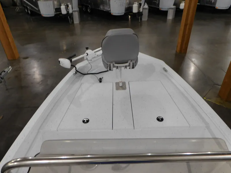 Slide: The Image of 2023 Xpress H190B boat interior with seating and storage compartments. - 5