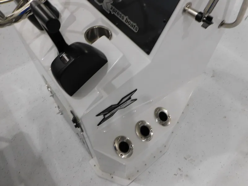 Slide: The Image of Control console of 2023 Xpress H190B boat with throttle and cup holder. - 8