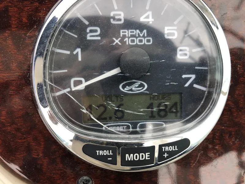 Slide: The Image of Close-up of 2009 Sea Ray 270 Sundancer tachometer showing RPM and hours. - 11