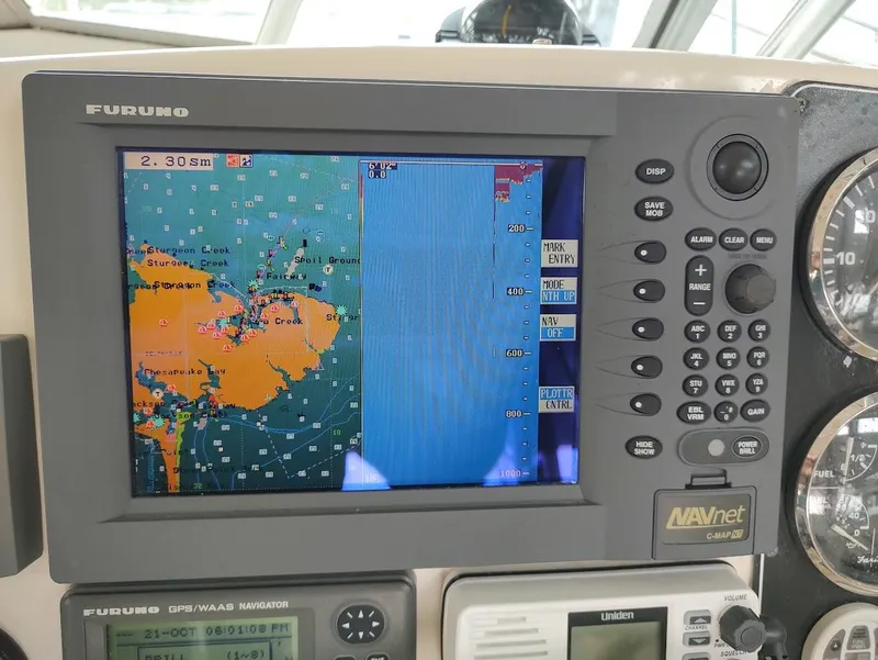 Slide: The Image of Furuno GPS navigation system on 2002 Pursuit 3000 Express boat, displaying nautical chart. - 45