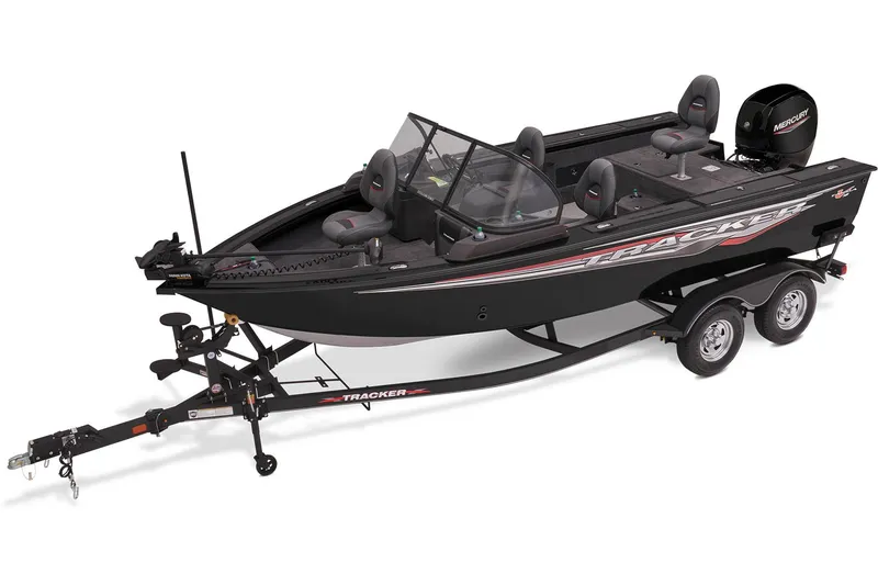 Slide: The Image of 2023 Tracker Targa V-18 WT boat on trailer, vibrant red, autumn trees background. - 2