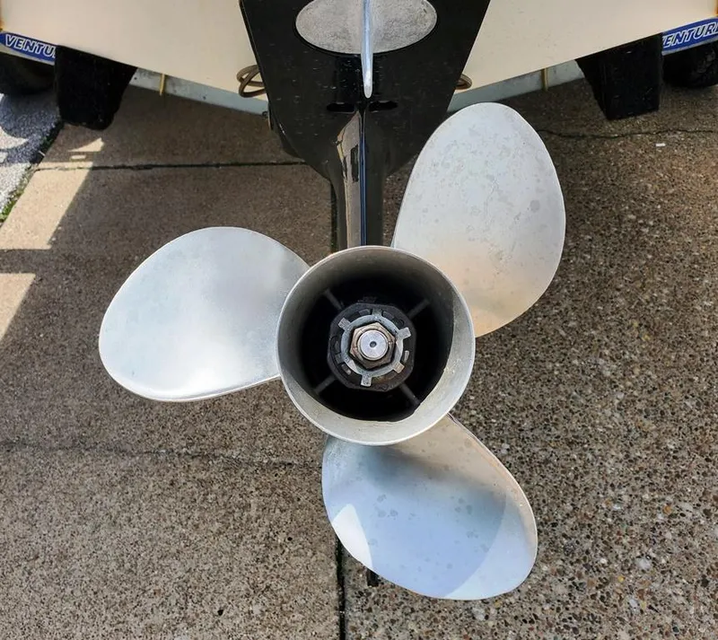Slide: The Image of Propeller of a 1984 Sea Ray 225 Cuddy Cabin boat on a trailer. - 10