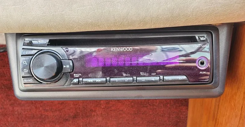 Slide: The Image of Kenwood stereo system in a 1984 Sea Ray 225 Cuddy Cabin boat. - 14