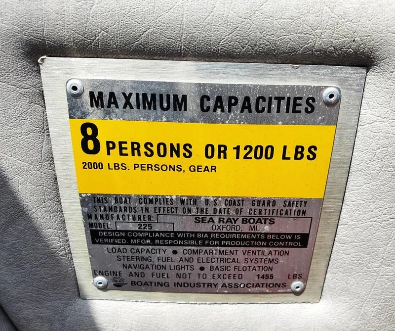 Slide: The Image of 1984 Sea Ray 225 Cuddy Cabin maximum capacity plate: 8 persons or 1200 lbs. - 15