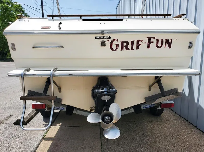Slide: The Image of 1984 Sea Ray 225 Cuddy Cabin boat rear view with Grif Fun name. - 8