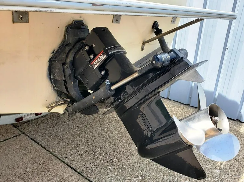 Slide: The Image of 1984 Sea Ray 225 Cuddy Cabin boat stern drive and propeller. - 9