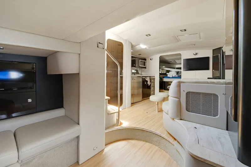 Slide: The Image of Luxurious interior of a 2016 Formula 40 PC yacht with modern furnishings and wood flooring. - 11