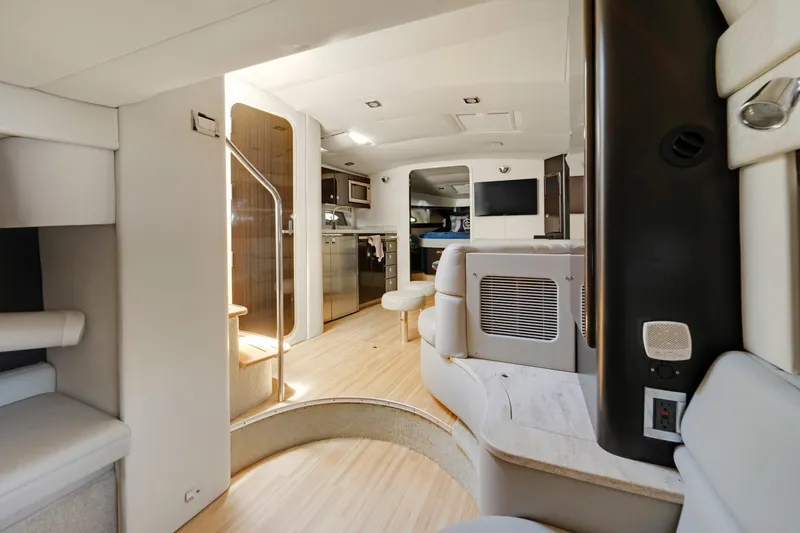 Slide: The Image of Interior of a 2016 Formula 40 PC yacht with modern furnishings and wood flooring. - 12