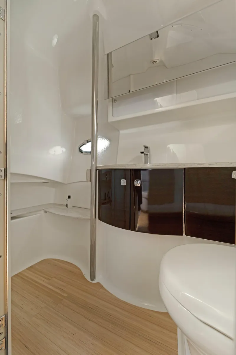 Slide: The Image of Modern bathroom interior of 2016 Formula 40 PC yacht with sleek design and wooden flooring. - 15