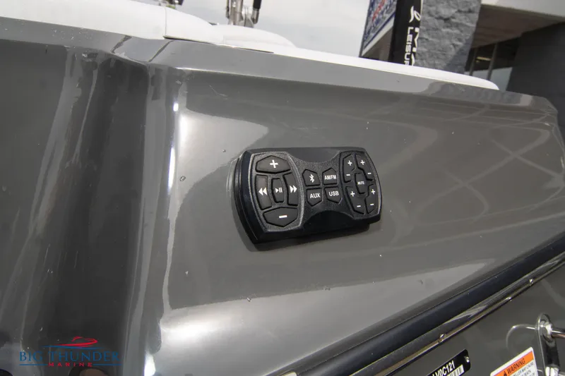 Slide: The Image of 2021 MasterCraft XStar boat control panel on gray exterior. - 12