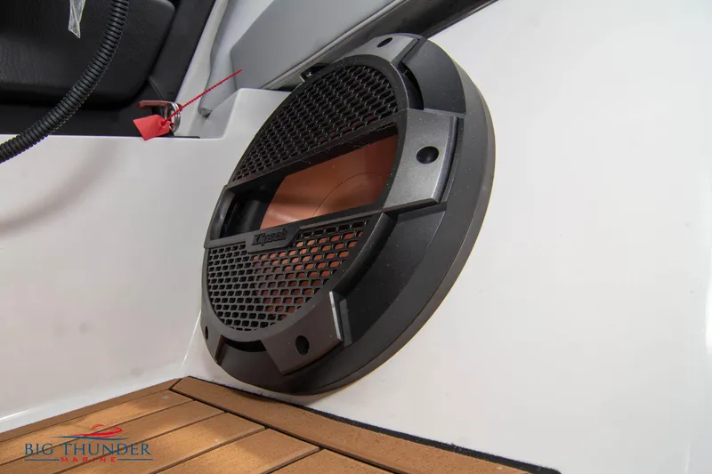 Slide: The Image of 2021 MasterCraft XStar boat speaker detail with teak flooring. - 33