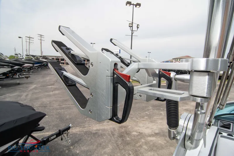 Slide: The Image of 2021 MasterCraft XStar wakeboard rack in a boat dealership. - 43