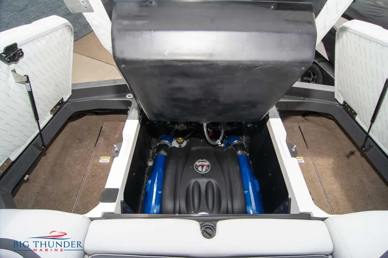 Slide: The Image of 2021 MasterCraft XStar engine compartment with open cover. - 45