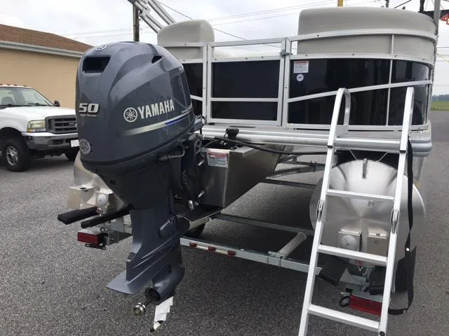 Slide: The Image of 2023 Starcraft LX 18 R pontoon boat with Yamaha 50 outboard motor. - 6