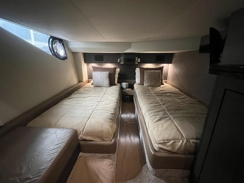 Slide: The Image of 2017 Marquis 500 Sport Yacht twin bed cabin interior. - 39