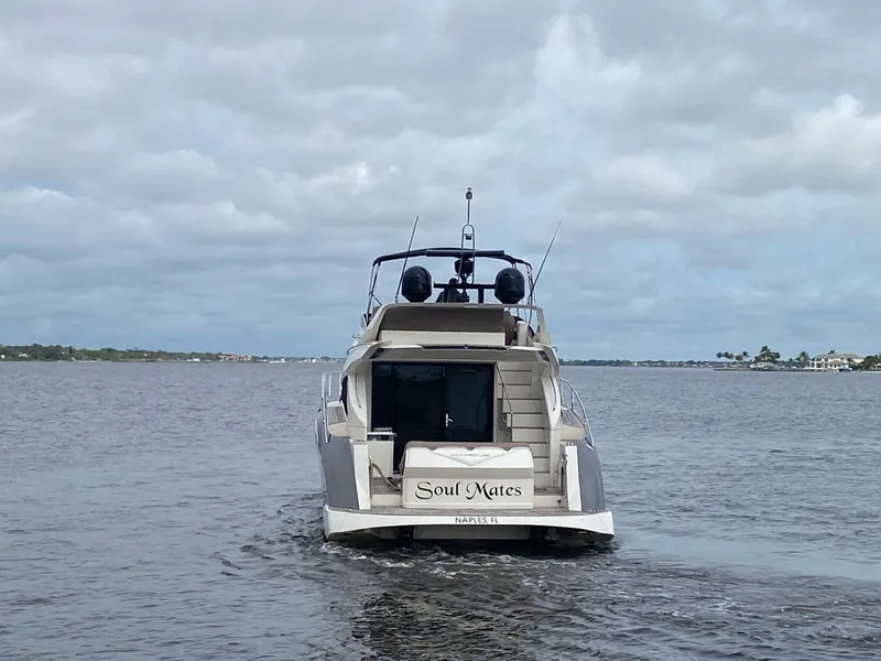 Slide: The Image of 2017 Marquis 500 Sport Yacht Soul Mates cruising on a cloudy day. - 5