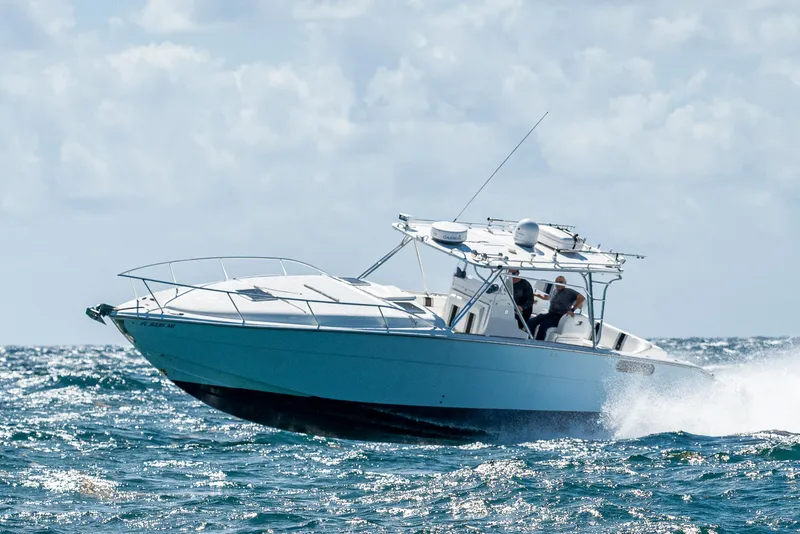 Slide: The Image of 2007 Marlin Yachts 42 cruising on open water. - 4