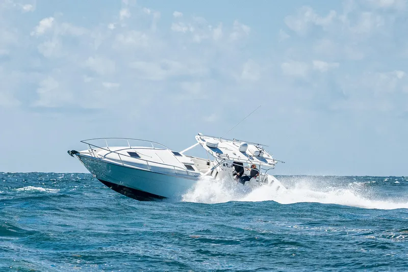 Slide: The Image of 2007 Marlin Yachts 42 cruising on open water. - 5