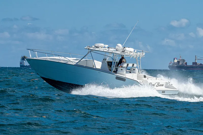 Slide: The Image of 2007 Marlin Yachts 42 cruising on open water. - 6