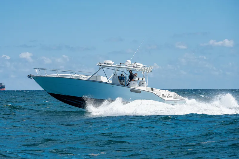 Slide: The Image of 2007 Marlin Yachts 42 cruising on open water. - 9