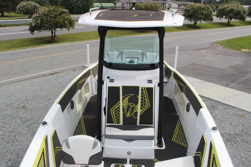Slide: The Image of 2023 Scarab 255 Open ID boat with modern design and spacious deck. - 13