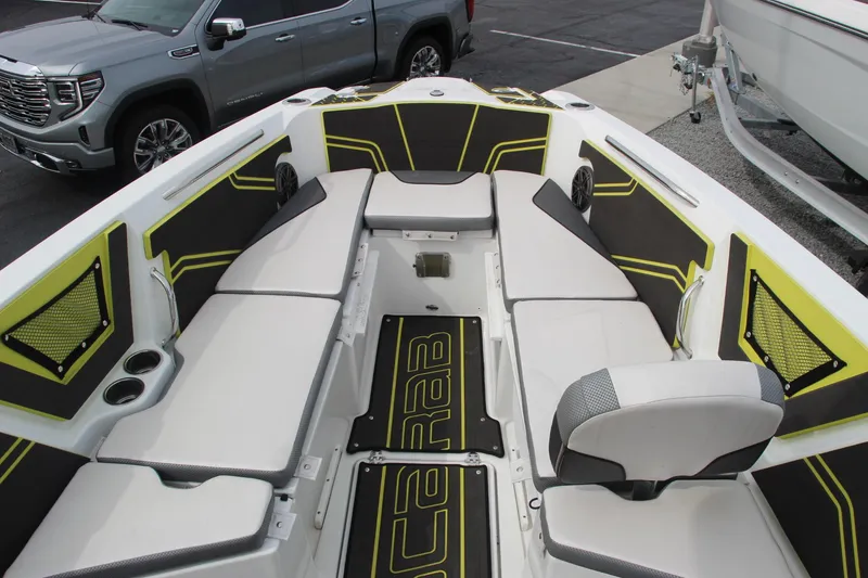 Slide: The Image of 2023 Scarab 255 Open ID boat interior with modern seating and design. - 14