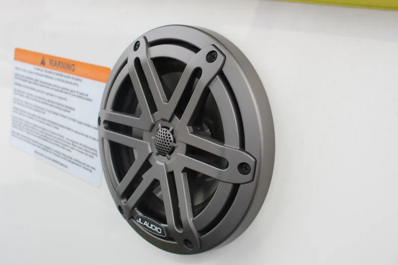 Slide: The Image of JL Audio speaker on 2023 Scarab 255 Open ID boat. - 17