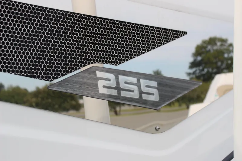 Slide: The Image of 2023 Scarab 255 Open ID boat emblem with modern design. - 7