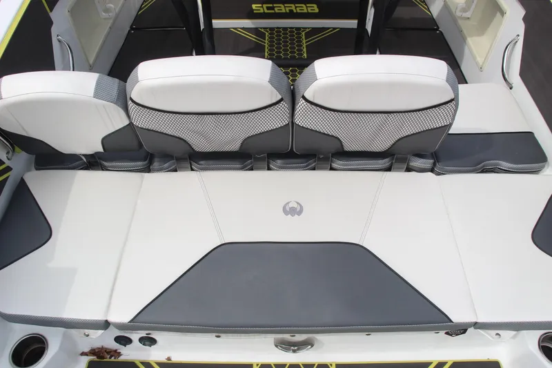 Slide: The Image of 2023 Scarab 255 Open ID boat interior with stylish seating and modern design. - 9