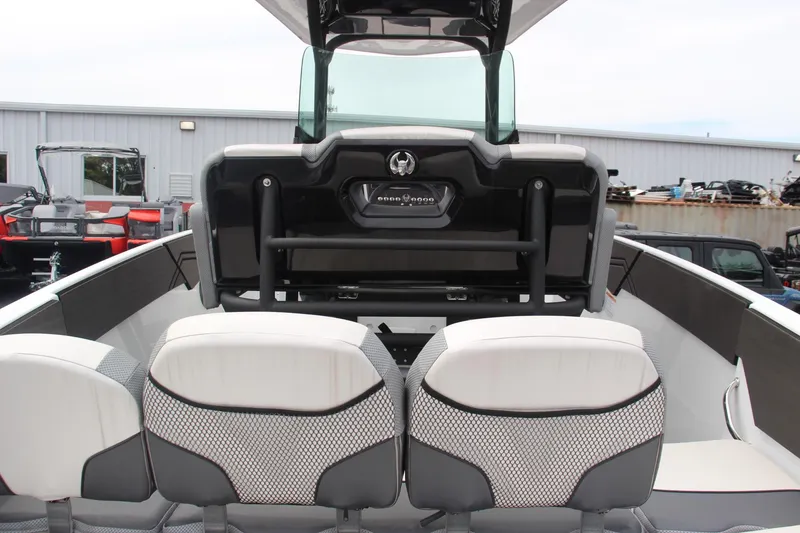 Slide: The Image of 2023 Scarab 255 Open ID boat interior with modern seating and sleek design. - 14