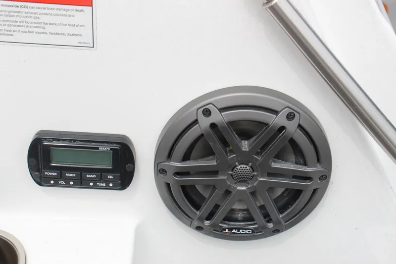 Slide: The Image of 2023 Scarab 255 Open ID boat audio system with JL Audio speaker. - 16