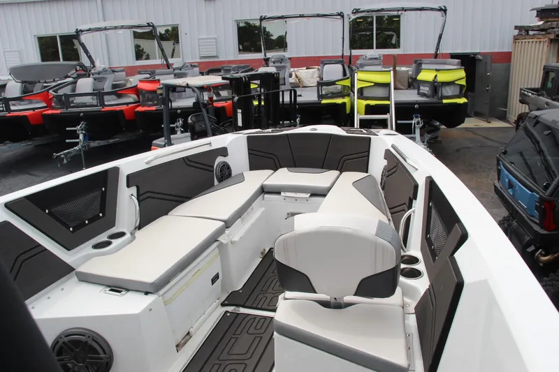 Slide: The Image of 2023 Scarab 255 Open ID boat interior with modern seating and sleek design. - 9