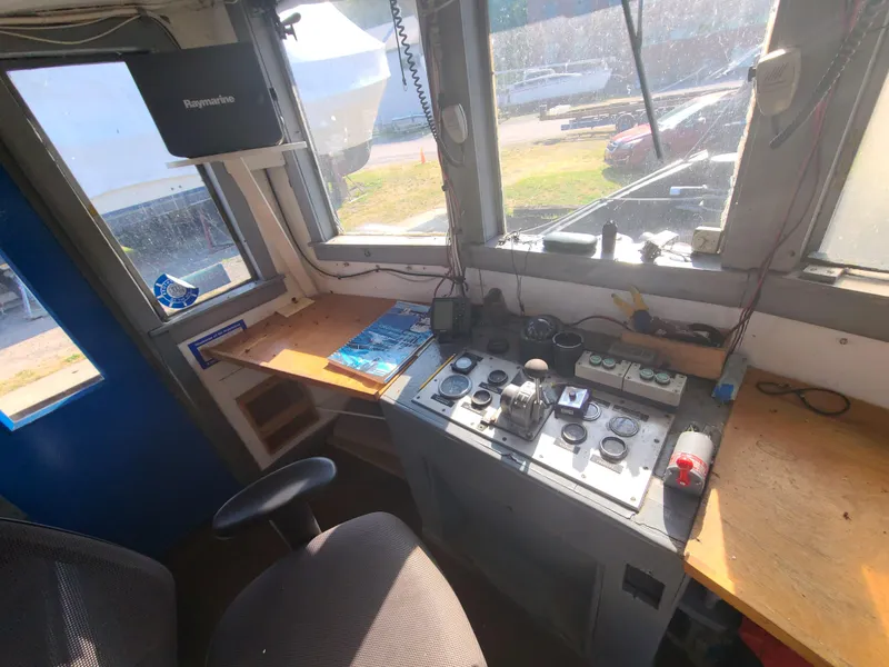 Slide: The Image of Interior of 1903 Johnson Brother Tug 64 control cabin with navigation equipment. - 29