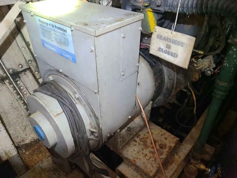 Slide: The Image of Johnson Brother Tug 64 engine, 1903 model, industrial machinery close-up. - 38