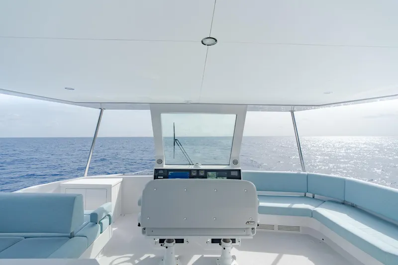 Slide: The Image of Modern Two Oceans 555 yacht interior, 2025 model, with ocean view and sleek seating. - 13