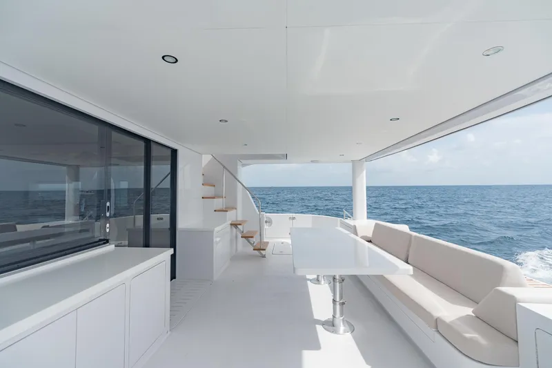 Slide: The Image of Luxury yacht Two Oceans 555, 2025 model, featuring a spacious deck with ocean view. - 17
