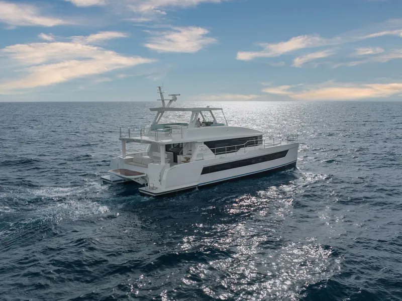 Slide: The Image of Luxury yacht Two Oceans 555 cruising on open sea, 2025 model. - 2