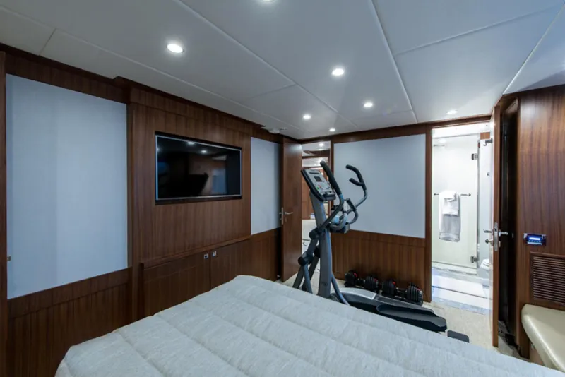Slide: The Image of Luxury bedroom with exercise equipment on 2020 Hargrave G120 yacht. - 35