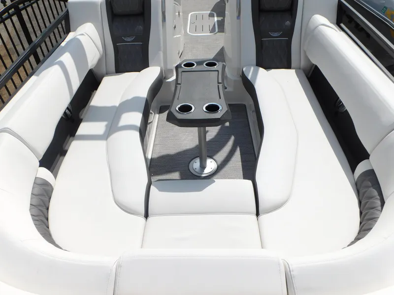 Slide: The Image of 2023 Bennington 25 RTFBA boat interior with white seating and cup holders. - 4