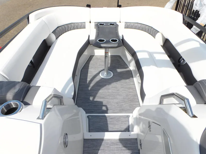 Slide: The Image of 2023 Bennington 25 RTFBA boat interior with white seating and cup holders. - 5