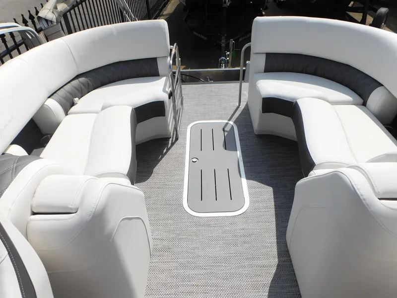 Slide: The Image of 2023 Bennington 25 RTFBA boat interior with luxurious seating and modern design. - 8