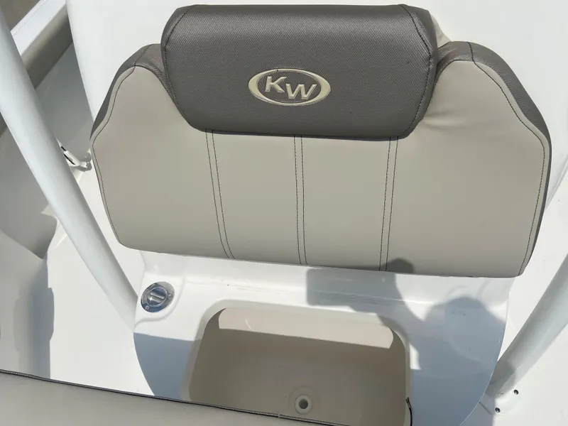 Slide: The Image of 2024 Key West 230 Bay Reef boat seat with storage compartment. - 10