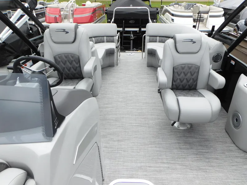 Slide: The Image of 2023 Bennington 24 LXSFBA pontoon boat interior with luxurious seating. - 5