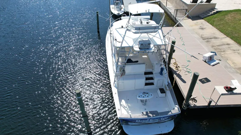 Slide: The Image of 2003 Ocean 40 Super Sport yacht docked at marina, aerial view. - 16