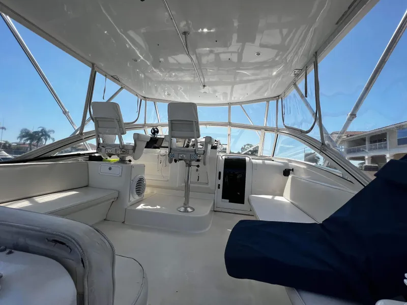 Slide: The Image of Interior view of 2003 Ocean 40 Super Sport yacht with seating and helm. - 26