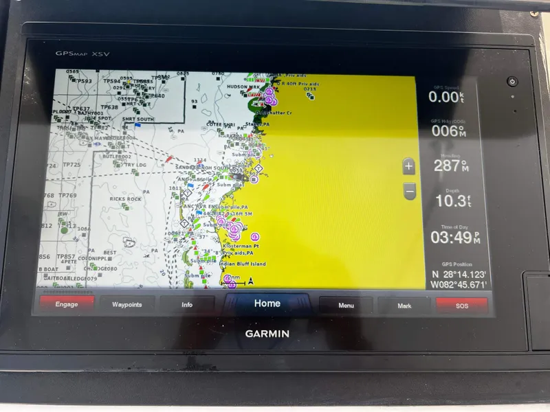 Slide: The Image of Garmin GPS display on Ocean 40 Super Sport, showing nautical map and navigation details. - 38