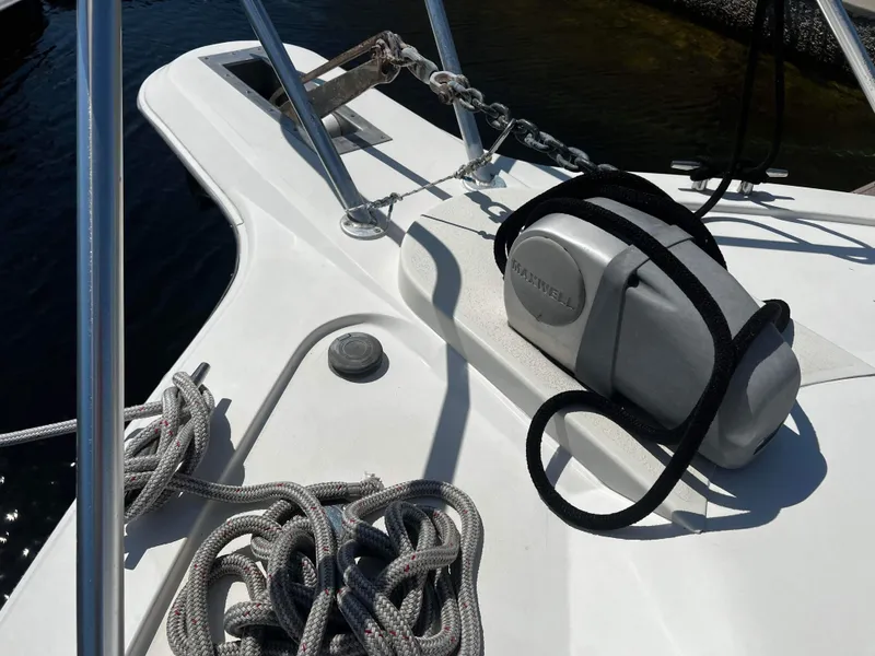 Slide: The Image of Bow of 2003 Ocean 40 Super Sport boat with anchor and ropes. - 41