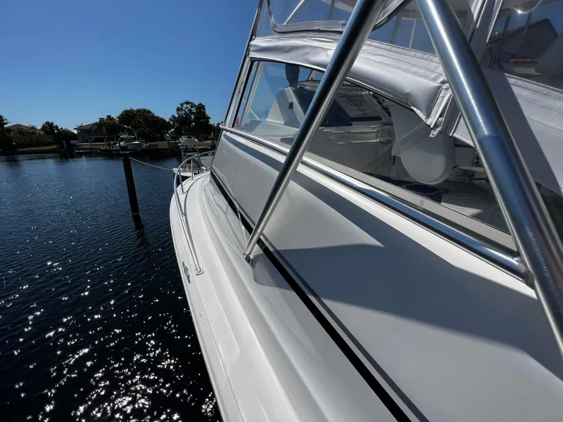 Slide: The Image of 2003 Ocean 40 Super Sport yacht docked on a sunny day. - 42