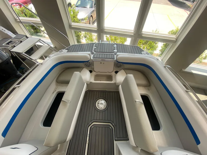 Slide: The Image of 2024 Starcraft SVX 211 boat interior with seating and deck view. - 10