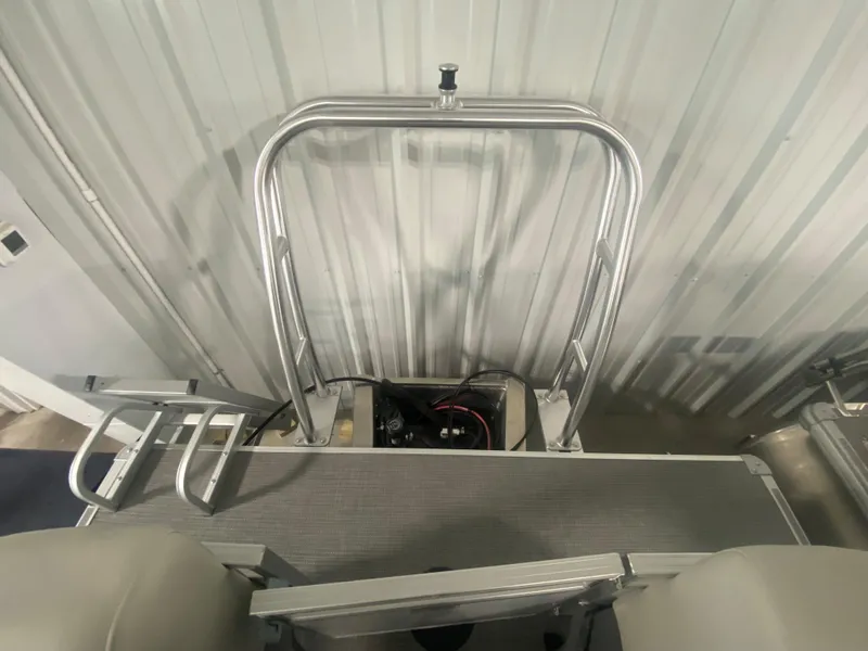 Slide: The Image of 2023 Starcraft LX22 R boat with rear deck and ladder. - 13